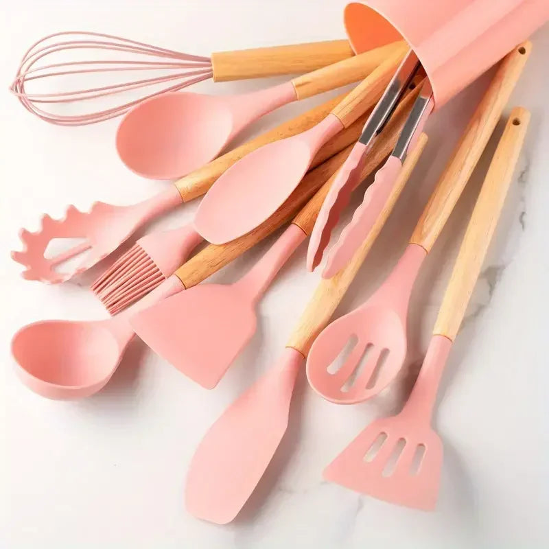 Set of four silicone cooking utensils with wooden handles from FusionCharm® Kitchen Set, including spatulas and spoons.
