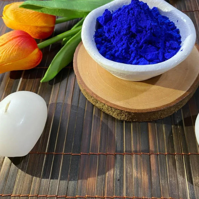 FusionCharm Pure Moroccan Blue Nila Powder for brightening skin, shown in a clear container with vibrant blue powder.