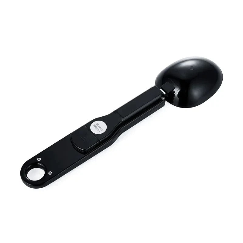 FusionCharm digital measuring spoon scale with clear digital display, compact kitchen tool for precise ingredient measurements.