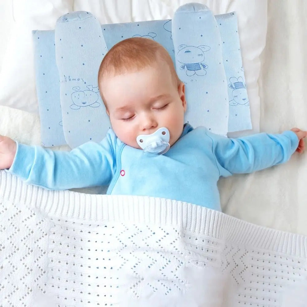 FusionCharm Baby Head Shaping Pillow with neck support and anti-roll design, ideal for newborns' comfortable head shaping.